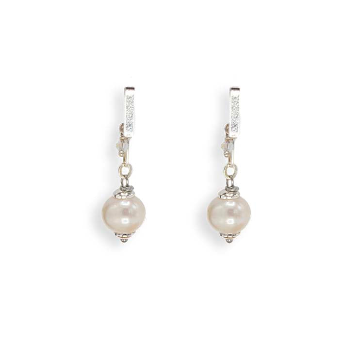 Oorbellen - Zoetwaterparels met Swarovski detail - kort